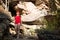 Lady Posing by Big Rock