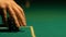 Lady putting poker chip rows on table, casino bet, chance of win and fortune