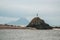 Lady on the Rock at WhakatÄne Heads, North Island, New Zealand