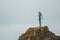 Lady on the Rock at WhakatÄne Heads, North Island, New Zealand