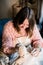 Lady sculptor working in her studio, ceramis artist`s hands