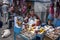 A lady selling various goods during the weekend market in Quinche in Ecuador.