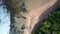 Lady silhouette practices yoga on yellow sandy beach