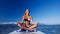Lady with slim figure in Lotus asana floats on paddle board