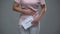 Lady touching her spasmed belly holding period calendar, female health, pms