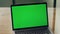 Lady using greenscreen laptop office close up. Anonymous business woman working