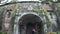 Lady walks toward church facade