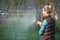 Lady Watering plants in garden