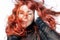 Lady woman with gorgeous red, fiery hair. Posing. White background in studio