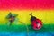 Ladybird and lucky clover on colorful crepe paper