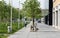 Laeken, Brussels Capital Region - Belgium - Flemish mother and child driving the bicycle at the Tour and Taxis site during the