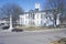 Lafayette County Court House in center of historic old southern town and storefronts of Oxford, MS