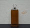 Lagerfeld, men`s fragrance, large perfume bottle in front of the satin wallcovering Elysee