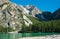 LAGO DI BRAIES, ITALY - SEPTEMBER 6, 2023: Tourist in the Lake Braies in the Dolomite mountains