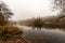 Lago di Cei Trentino Italy - Small alpine lake with fog