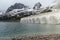 Lago Fedaia on the Passo Fedia in the Dolomites above Canazei. Dam beneath the Marmolada  with low levels of Water in the