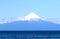 Lago Lake Llanquihue at Puerto Varas. Snowcapped Osorno Volcano in the background. Chile, South America