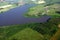 Lagoon and agriculture green fields