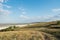 Lagoon estuary Molochnyi liman landscape grass path road clouds blue sky