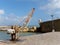 LAGOS, ALGARVE/PORTUGAL - MARCH 5 : Old Crane outside Fort Ponta da Bandeira in Lagos, Algarve Portugal on March 5, 2018