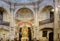 Laguardia, Alava, Spain. March 30, 2018: Main altar, golden altarpiece and apse of the Romanesque-Gothic church-fortress called Sa