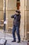 Laguardia, Alava, Spain. March 30, 2018: Street violinist playing music in the main square of the town called Mayor in front of la