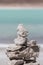 Laguna Verde with blue sky and pile of stones, Bolivia