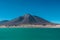 Laguna Verde green water lagoon lake and volcano in Chile mountains of Altiplano