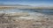 Laguna y Termas de Polques hot spring pool with Salar de Chalviri in background, Salar de Uyuni, Potosi, Bolivia