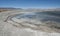 Laguna y Termas de Polques hot spring pool with Salar de Chalviri in background, Salar de Uyuni, Potosi, Bolivia