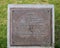 Lahaina Registered National Historic Landmark plaque in Lahaina Banyan Court Park.