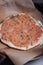 Lahmacun, Turkish flatbread with minced meat and vegetables topping.