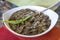 Laing is a Filipino dish composed of dried taro leaves and coconut milk