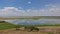 Lake in the African savannah. The smooth, mirror-like surface of the water