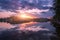 Lake against colorful sky with clouds at sunset