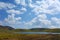 Lake Akna surrounded by Geghama mountains on a hiking trail leading from Azhdahak volcano in Armenia