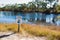 Lake with alligators in Florida. Signboard prohibiting swim