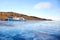 Lake Baikal in December. View of the frozen Kurkut Bay in the rays of the setting sun