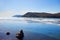 Lake Baikal in the spring. Small ice floes in the lake water. A sunny April day. The Village Of Listvyanka