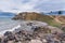 Lake Baikal in stormy weather. View of the sacred cape Burkhan and Shamanka rock