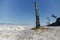 Lake Baikal in winter. Beautiful rocky island on a background of blue sky and ice