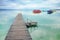 Lake Balaton with a pier and pedal boats in th