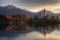 Lake Bled, castle Bled and church Assumption of the Virgin Mary - morning autumn picture