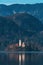 Lake Bled in cold february morning with famous landmark, the Assumption of Maria Church in background