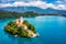 Lake Bled in Slovenia. Beautiful mountains and Bled lake with small Pilgrimage Church. Bled lake and island with Pilgrimage Church