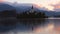 Lake Bled, Slovenia with St. Marys Church of the Assumption on the small island in the water and beautiful sunset