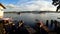 Lake boatman paddle his row boat across the lake