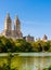 Lake with boats in Central Park in midtown Manhattan in New York City with Eldorado building