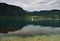 Lake Bohinj with a super clear water and a sailing boat