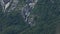LAKE BOHINJSKO, SLOVENIA - APRIL, 2023: Aerial drone footage. Mauntain landscape near lake from the air on sunny day